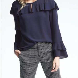 Navy long sleeve flounce top
